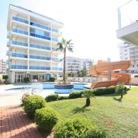 Квартира на первой линии моря/озера, в пригороде в Турции, 55 кв.м.